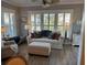 Inviting living room with bright, natural light coming through shuttered windows at 2009 Utsey St, Johns Island, SC 29455