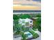 Stunning modern home with a pool and beautifully landscaped yard near the water at 204 E Huron Ave, Folly Beach, SC 29439