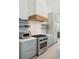 Well-equipped kitchen with stainless steel appliances and ample cabinet space for modern living at 204 E Huron Ave, Folly Beach, SC 29439