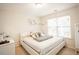 Cozy bedroom with a bright window, comfortable bed, and neutral decor, perfect for relaxation at 2049 Maybelles Ln, Charleston, SC 29414