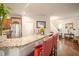 Bright open kitchen with granite countertops and stainless steel appliances, perfect for cooking and entertaining at 2049 Maybelles Ln, Charleston, SC 29414