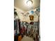 Walk-in closet with ample shelving and hanging space for wardrobe storage and closet organization at 2049 Maybelles Ln, Charleston, SC 29414