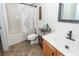Bright bathroom featuring a shower-tub combo with updated vanity at 2052 Bancroft Ln, Mount Pleasant, SC 29466