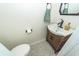 Compact powder room with stylish vanity, modern faucet, and patterned tile floor at 2052 Bancroft Ln, Mount Pleasant, SC 29466