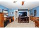 Bonus room with wood paneled walls, entertainment center and a ceiling fan at 2052 Bancroft Ln, Mount Pleasant, SC 29466