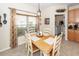 Inviting dining area featuring a wooden table, stylish decor, and a view to the outdoors at 2052 Bancroft Ln, Mount Pleasant, SC 29466