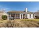 Exterior view showing the screened patio and outdoor living space at 2052 Bancroft Ln, Mount Pleasant, SC 29466