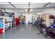 Spacious garage with epoxy flooring and ample storage, perfect for hobbies and vehicles at 2052 Bancroft Ln, Mount Pleasant, SC 29466