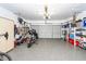 Well-organized garage features epoxy flooring, storage cabinets, and ample space at 2052 Bancroft Ln, Mount Pleasant, SC 29466