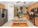 Well-appointed kitchen featuring granite countertops, stainless steel appliances, and an island with seating at 2052 Bancroft Ln, Mount Pleasant, SC 29466