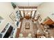 A bright living room features a fireplace, hardwood floors, built-in shelving, and neutral decor at 2052 Bancroft Ln, Mount Pleasant, SC 29466