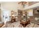 Large living room features a fireplace, hardwood floors, and plenty of seating at 2052 Bancroft Ln, Mount Pleasant, SC 29466