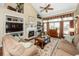 Relaxing living room with a fireplace, TV, built-in shelves and hardwood floors at 2052 Bancroft Ln, Mount Pleasant, SC 29466