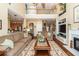 Open-concept living room and kitchen with hardwood floors and staircase at 2052 Bancroft Ln, Mount Pleasant, SC 29466
