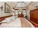 Spacious bedroom featuring a tray ceiling, plenty of natural light and tasteful decor at 2052 Bancroft Ln, Mount Pleasant, SC 29466