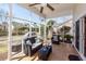 Cozy screened porch with comfortable seating, perfect for enjoying the outdoors at 2052 Bancroft Ln, Mount Pleasant, SC 29466