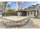 Scenic backyard featuring large patio, privacy fence, and well-kept flower beds at 211 Logan Dr, Summerville, SC 29483