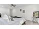 Comfortable bedroom with a double bed, light walls, ceiling fan, and modern decor at 211 Logan Dr, Summerville, SC 29483
