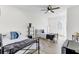 Comfortable bedroom with two twin beds, ceiling fan, and access to the exterior at 211 Logan Dr, Summerville, SC 29483