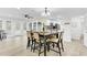 Open dining area with a view of the kitchen and sunroom at 211 Logan Dr, Summerville, SC 29483