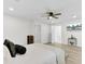 Spacious main bedroom with ceiling fan and view of the entry to the bath at 211 Logan Dr, Summerville, SC 29483