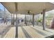 Spacious outdoor deck featuring ceiling fan and charming views at 211 Logan Dr, Summerville, SC 29483
