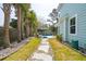Charming backyard with a pool, lounge chairs, lush landscaping, and a stone pathway at 2165 Annie Laura Ln, Mount Pleasant, SC 29466