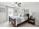 Inviting bedroom with a wooden bed frame, decorative pillows, side tables, and framed art at 2165 Annie Laura Ln, Mount Pleasant, SC 29466