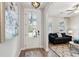 Bright entryway with a view into the living room, featuring a modern aesthetic at 2165 Annie Laura Ln, Mount Pleasant, SC 29466