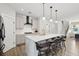 Modern kitchen with an island, pendant lights, and stainless steel appliances at 2165 Annie Laura Ln, Mount Pleasant, SC 29466