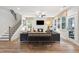 Bright living room boasting a fireplace, ceiling fan, staircase, and access to the outdoors at 2165 Annie Laura Ln, Mount Pleasant, SC 29466