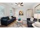 Well-lit living room featuring plush seating, stylish decor, and ample natural light at 2165 Annie Laura Ln, Mount Pleasant, SC 29466