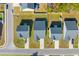 Overhead view of homes with lush, green lawns and neatly paved driveways in a well-maintained neighborhood at 223 Sugarberry Lane, Moncks Corner, SC 29461