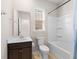 Well-lit bathroom featuring a modern vanity, toilet, and shower-tub combination, creating a functional design at 223 Sugarberry Lane, Moncks Corner, SC 29461