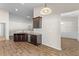 Open kitchen featuring granite countertops, stainless steel appliances, and hardwood floors at 223 Sugarberry Lane, Moncks Corner, SC 29461