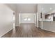 Spacious living area showcasing hardwood floors, neutral walls, and an open-concept layout for seamless living at 223 Sugarberry Lane, Moncks Corner, SC 29461