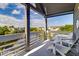 Scenic balcony with views of the neighborhood and the water, complemented by cozy seating arrangements at 2472 Racquet Club Dr, Seabrook Island, SC 29455