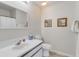 Bright bathroom with a modern white vanity, framed mirror, and essential fixtures in a clean setting at 2472 Racquet Club Dr, Seabrook Island, SC 29455