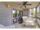 Comfortable porch featuring white wicker seating, offering a relaxing outdoor space at 2472 Racquet Club Dr, Seabrook Island, SC 29455