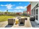 Outdoor patio with comfortable seating and a fire pit, ideal for relaxation and entertainment at 2842 Rutherford Way, Charleston, SC 29414