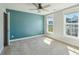 Bedroom with natural light and two windows, featuring a fan at 2842 Rutherford Way, Charleston, SC 29414