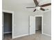 Bedroom with neutral walls featuring fan and a view of two doorways at 2842 Rutherford Way, Charleston, SC 29414