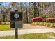 Carolina Bay Dog Park sign with walking path and landscaping at 2842 Rutherford Way, Charleston, SC 29414