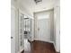 Bright foyer with hardwood floors, a front door, and glass doors leading to another room at 2842 Rutherford Way, Charleston, SC 29414