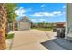 Detached garage with a paved driveway and manicured landscaping, blending functionality with style at 2842 Rutherford Way, Charleston, SC 29414