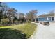 Sprawling backyard featuring large patio area, perfect for outdoor entertaining at 2899 Doncaster Dr, Charleston, SC 29414