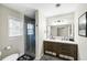 Updated bathroom boasts double vanity, modern fixtures, and walk-in shower at 2899 Doncaster Dr, Charleston, SC 29414
