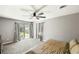 Bedroom featuring sliding glass door to backyard, carpet, and ceiling fan at 2899 Doncaster Dr, Charleston, SC 29414