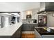 Bright modern kitchen with stainless steel appliances and gray and white cabinets at 2899 Doncaster Dr, Charleston, SC 29414