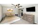 Main bedroom features an ensuite bathroom, ceiling fan, and ample natural light at 2899 Doncaster Dr, Charleston, SC 29414
